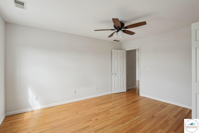 29950 Binder Rd, Green Ridge, MO 65332 - spare room with light wood-style flooring, ceiling fan, and baseboards