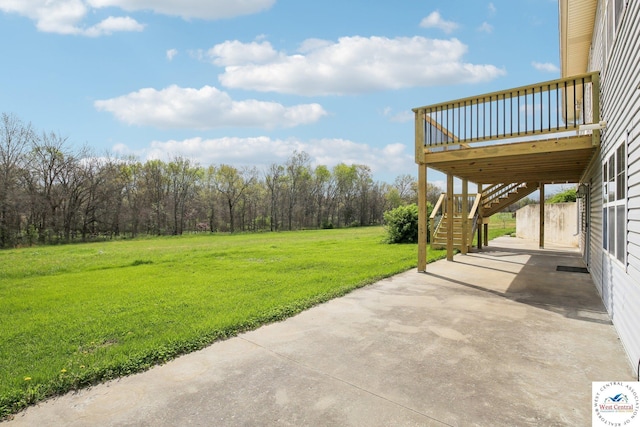 29950 Binder Rd, Green Ridge, MO 65332 - view of grassy yard featuring stairs, a wooden deck, a patio area, and a forest view