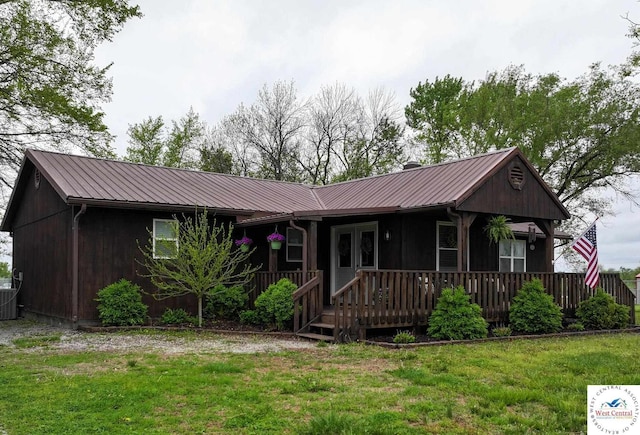 782 SE 250th Rd, Clinton, MO 64735 - single story home featuring french doors, metal roof, central AC, and a front lawn