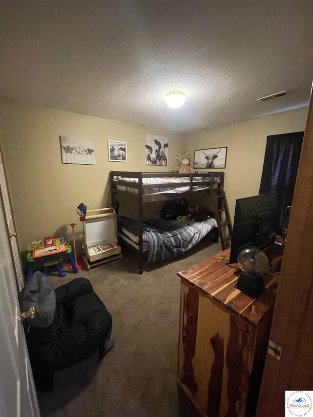 725 N Max Stevens St, Adrian, MO 64720 - carpeted bedroom with a textured ceiling