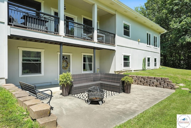 917 N Washboard Rd, Sibley, MO 64088 - patio / terrace featuring a fire pit, a patio, and a lawn