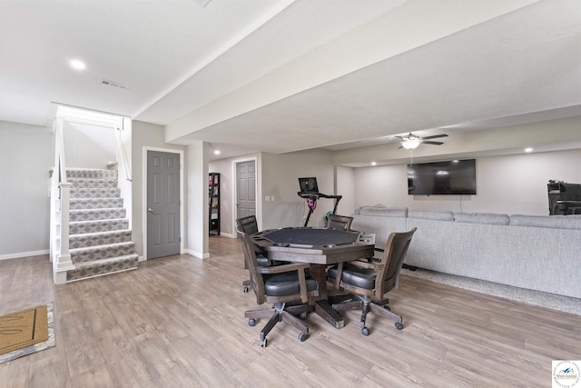 917 N Washboard Rd, Sibley, MO 64088 - dining area with wood finished floors, ceiling fan, stairway, baseboards, and recessed lighting
