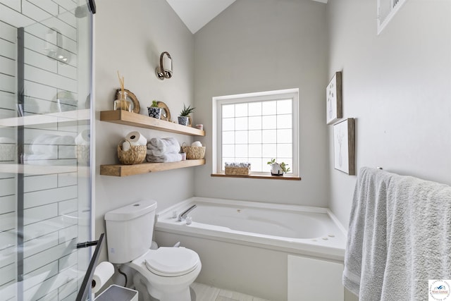 917 N Washboard Rd, Sibley, MO 64088 - bathroom featuring toilet, a bath, vaulted ceiling, and tiled shower