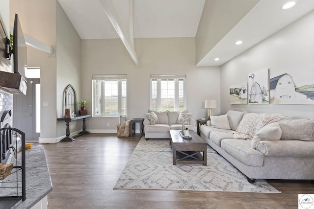 917 N Washboard Rd, Sibley, MO 64088 - living area with high vaulted ceiling, dark wood finished floors, recessed lighting, baseboards, and beam ceiling