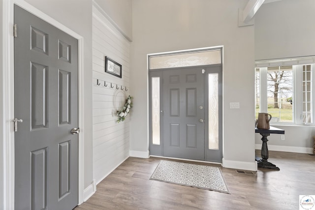 917 N Washboard Rd, Sibley, MO 64088 - foyer entrance featuring a high ceiling, wood finished floors, and baseboards
