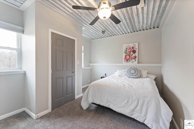 917 N Washboard Rd, Sibley, MO 64088 - carpeted bedroom with baseboards and ceiling fan