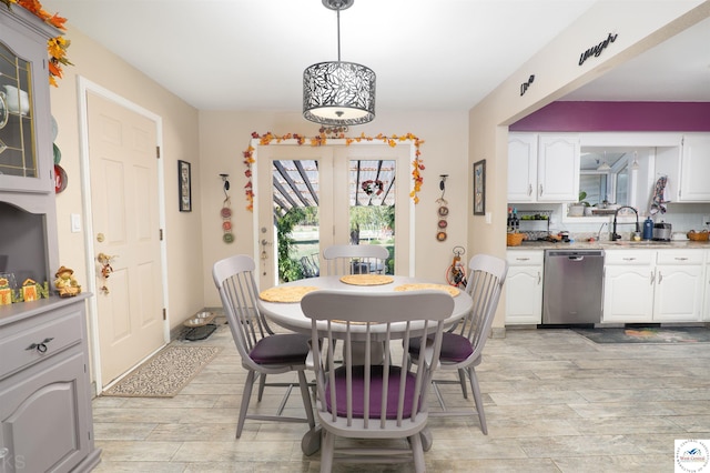 dining area with light wood finished floors
