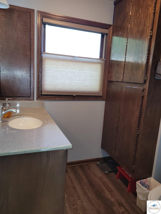 31150 Highview Rd, Edwards, MO 65326 - bathroom featuring vanity, wood finished floors, and baseboards