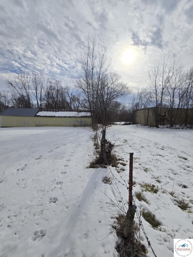 808 E 19th St, Sedalia, MO 65301 - view of yard layered in snow