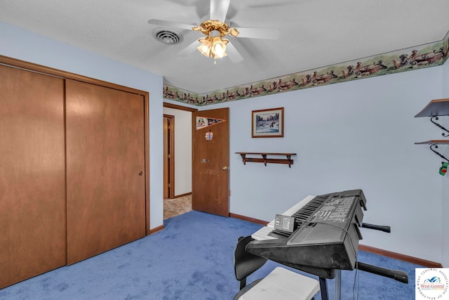20390 Kindle Rd, Warsaw, MO 65355 - home office with carpet flooring, a ceiling fan, and baseboards
