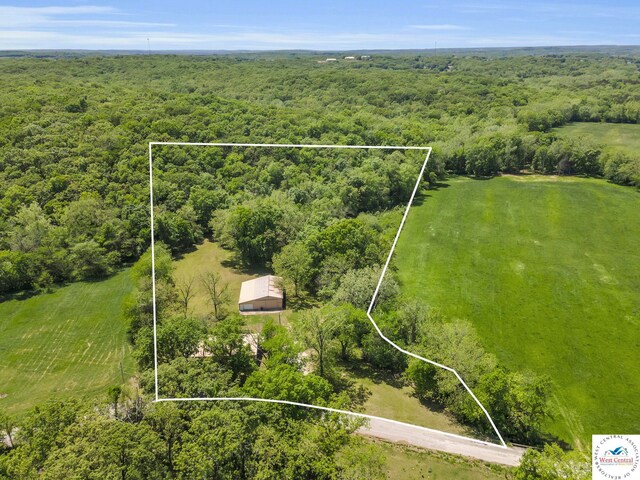20390 Kindle Rd, Warsaw, MO 65355 - aerial view of property's location featuring a forest and property parcel outlined