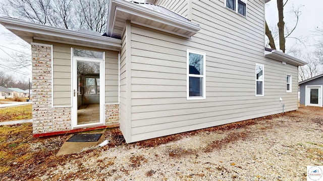 607 E Benton St, Windsor, MO 65360 - view of home's exterior featuring stone siding