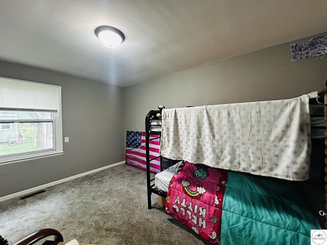 106 W Fairview St, Clinton, MO 64735 - carpeted bedroom featuring baseboards