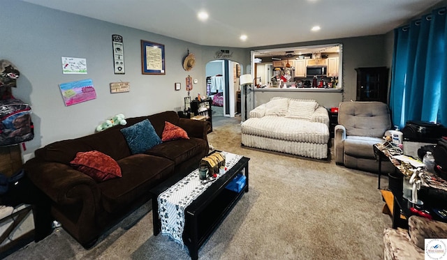 106 W Fairview St, Clinton, MO 64735 - carpeted living area with arched walkways and recessed lighting
