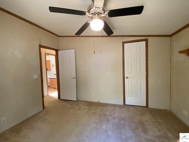 11371 Dawn Dr, Warsaw, MO 65355 - unfurnished bedroom with carpet flooring, ornamental molding, and ceiling fan