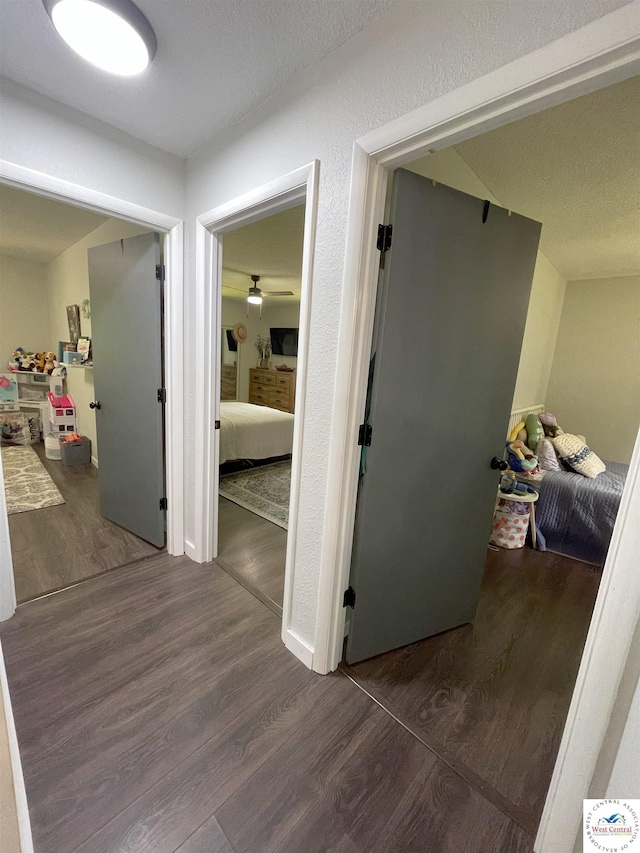 22756 Hickory Chapel Ave, Lincoln, MO 65338 - hallway featuring wood finished floors and a textured ceiling