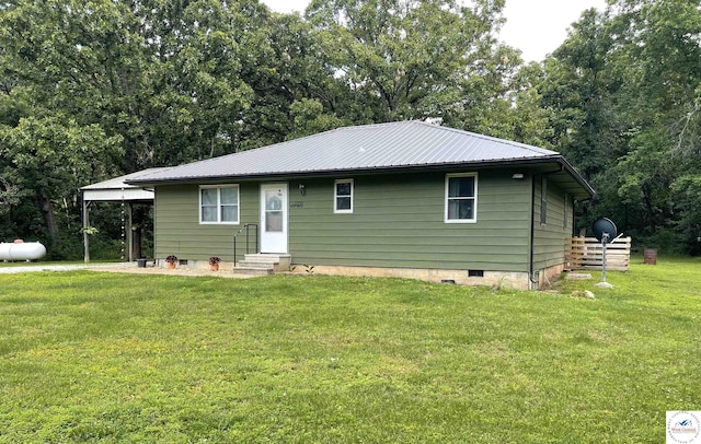 22756 Hickory Chapel Ave, Lincoln, MO 65338 - view of front of home with entry steps, crawl space, a front lawn, and metal roof