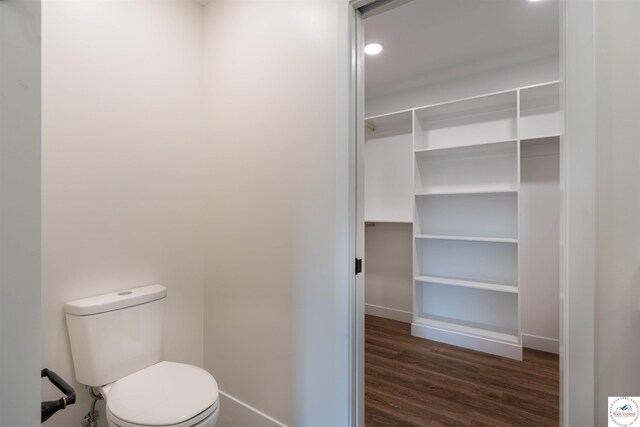 1504 E 7th St, Sedalia, MO 65301 - bathroom featuring wood finished floors and recessed lighting
