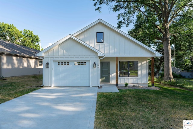1504 E 7th St, Sedalia, MO 65301 - modern farmhouse style home featuring a garage, board and batten siding, and driveway