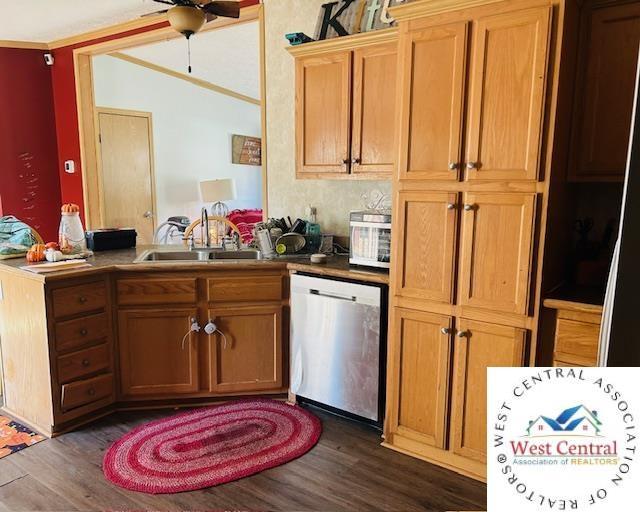 214 SE State St, Milan, MO 63556 - kitchen featuring ceiling fan, dishwasher, dark wood-style floors, and a sink