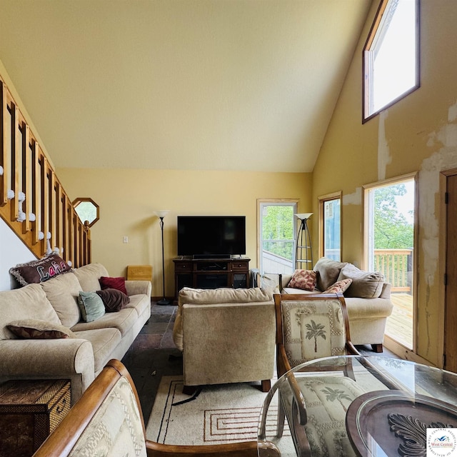 30342 Sassafras Dr, Warsaw, MO 65355 - living room with high vaulted ceiling, healthy amount of natural light, stairs, and wood finished floors
