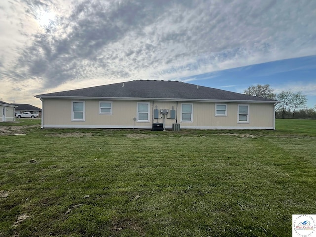 100 NW 4343 P Ln, Clinton, MO 64735 - rear view of house featuring a yard and central air condition unit