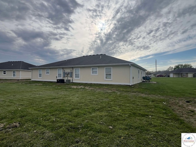 100 NW 4343 P Ln, Clinton, MO 64735 - rear view of property featuring a yard and central air condition unit