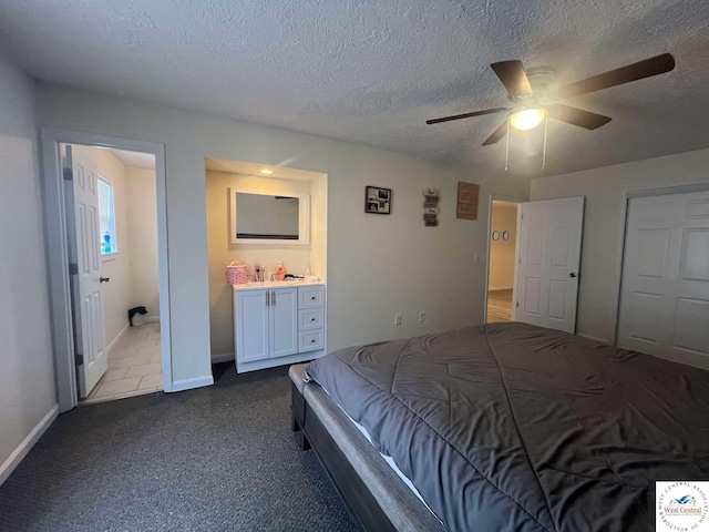 100 NW 4343 P Ln, Clinton, MO 64735 - bedroom with connected bathroom, a ceiling fan, baseboards, a textured ceiling, and carpet floors