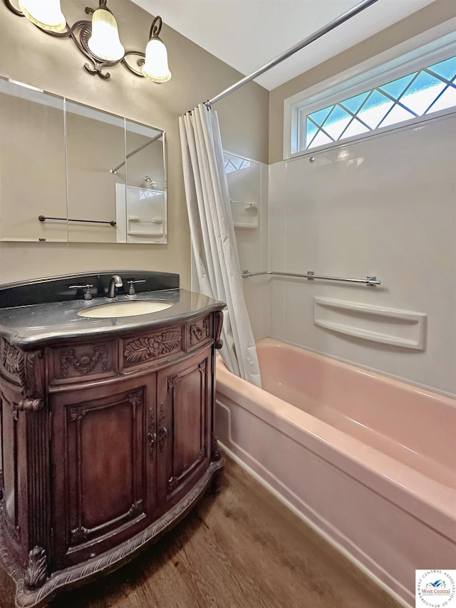 26684 Waterview Dr, Warsaw, MO 65355 - full bathroom with shower / tub combo with curtain, vanity, and wood finished floors