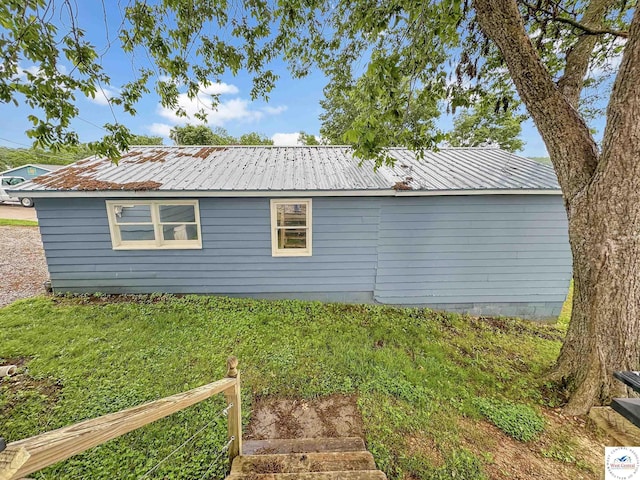 26684 Waterview Dr, Warsaw, MO 65355 - view of property exterior with a metal roof