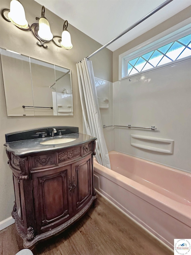 26684 Waterview Dr, Warsaw, MO 65355 - bathroom with wood finished floors, shower / bath combo, and vanity