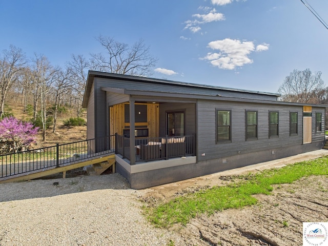 100 Mayerling Dr, Laurie, MO 65037 - view of front of home with crawl space