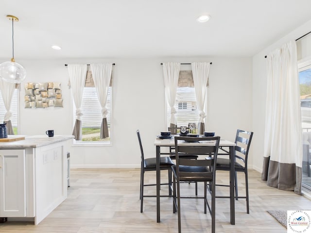 100 Mayerling Dr, Laurie, MO 65037 - dining room with light wood-style floors, baseboards, and plenty of natural light