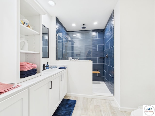 100 Mayerling Dr, Laurie, MO 65037 - full bathroom featuring a walk in shower, baseboards, recessed lighting, and vanity