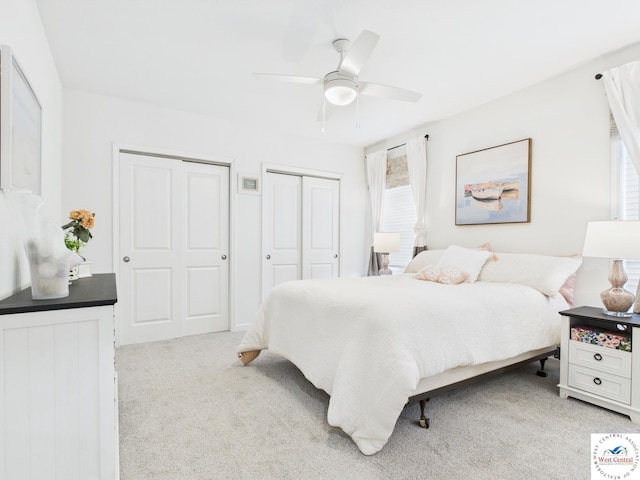 100 Mayerling Dr, Laurie, MO 65037 - bedroom featuring carpet flooring, multiple closets, and ceiling fan