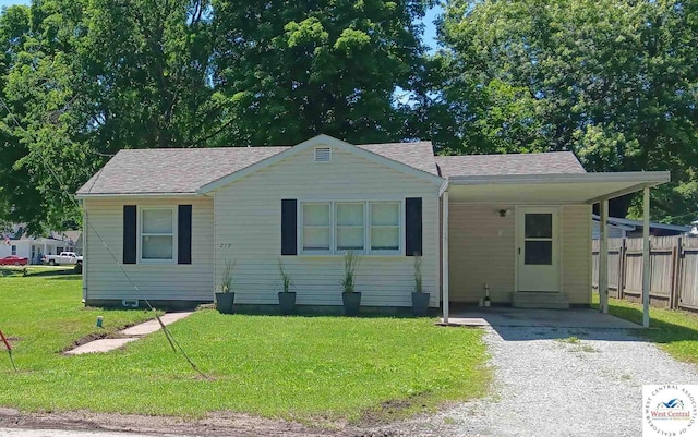 219 S 6th St, Clinton, MO 64735 - view of front of property with a shingled roof and gravel driveway
