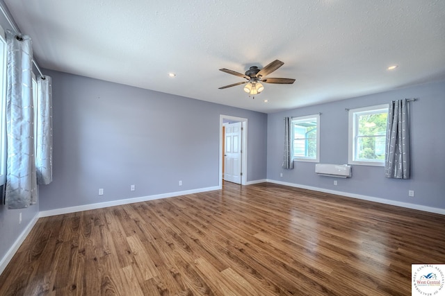 28848 Paradise Dr, Warsaw, MO 65355 - unfurnished room with baseboards, a ceiling fan, wood finished floors, and recessed lighting