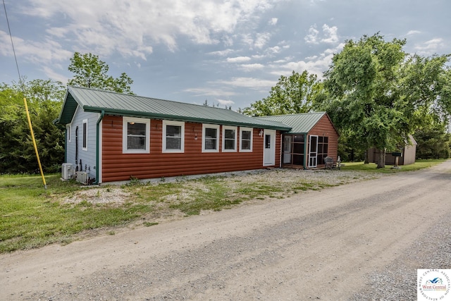 28848 Paradise Dr, Warsaw, MO 65355 - ranch-style home featuring faux log siding and metal roof