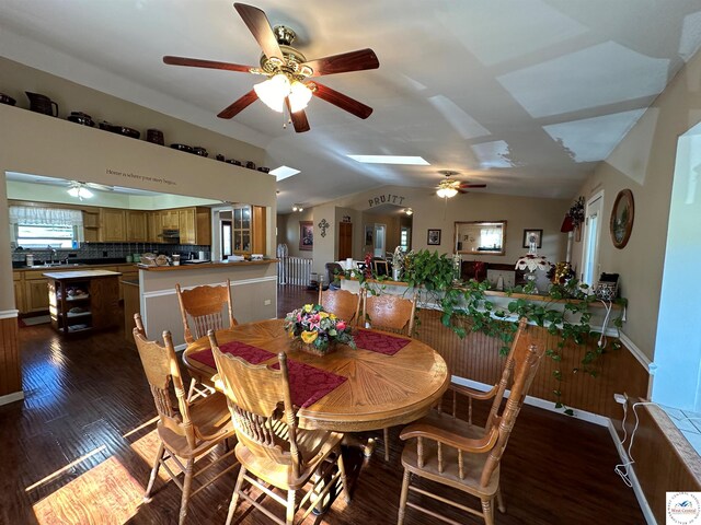 23111 Lange Rd, Cole Camp, MO 65325 - dining area featuring ceiling fan, dark wood-style flooring, and lofted ceiling