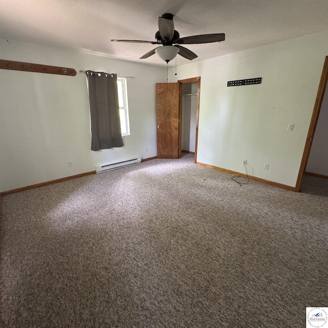 unfurnished bedroom featuring a closet, carpet floors, a ceiling fan, baseboard heating, and baseboards