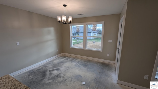 302 E Jamestown Dr, Clinton, MO 64735 - unfurnished dining area featuring a chandelier and concrete flooring