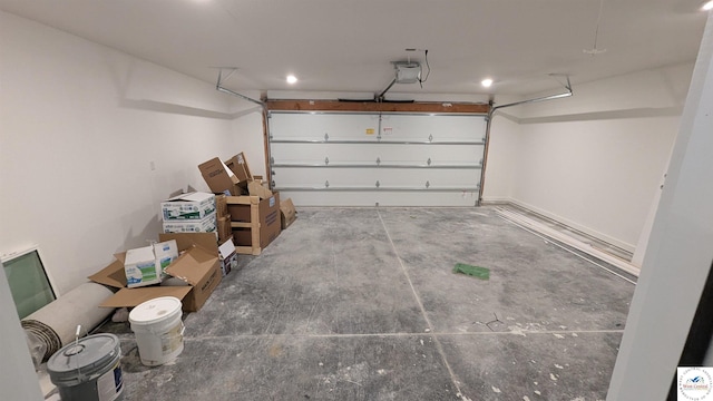 302 E Jamestown Dr, Clinton, MO 64735 - garage with a garage door opener and recessed lighting