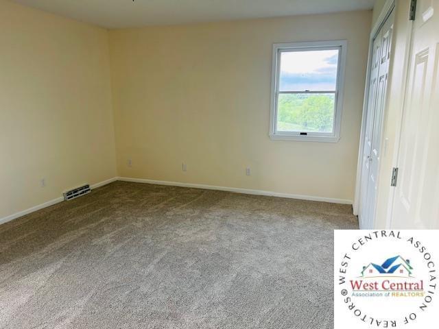 45869 E Hwy, Milan, MO 63556 - unfurnished bedroom with carpet and baseboards