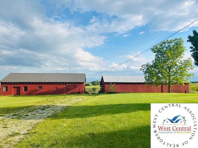 45869 E Hwy, Milan, MO 63556 - view of green lawn featuring a pole building and an outdoor structure