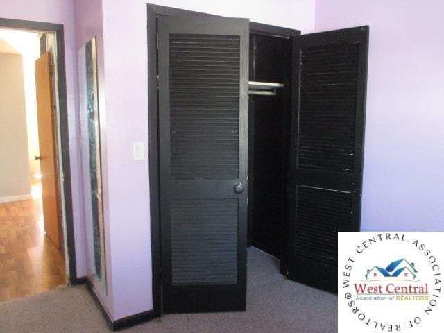 unfurnished bedroom with baseboards