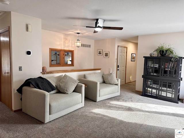 32291 Barclay Loop, Warsaw, MO 65355 - carpeted living area with ceiling fan and baseboards