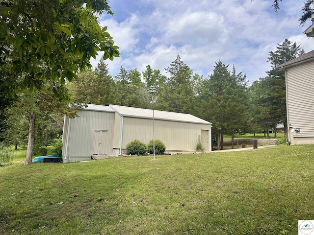 32291 Barclay Loop, Warsaw, MO 65355 - view of grassy yard with an outbuilding and an outdoor structure