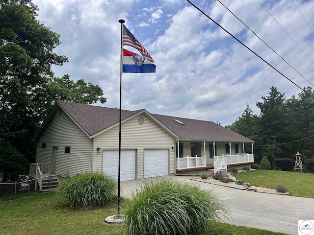 32291 Barclay Loop, Warsaw, MO 65355 - ranch-style house featuring covered porch, driveway, an attached garage, and a shingled roof