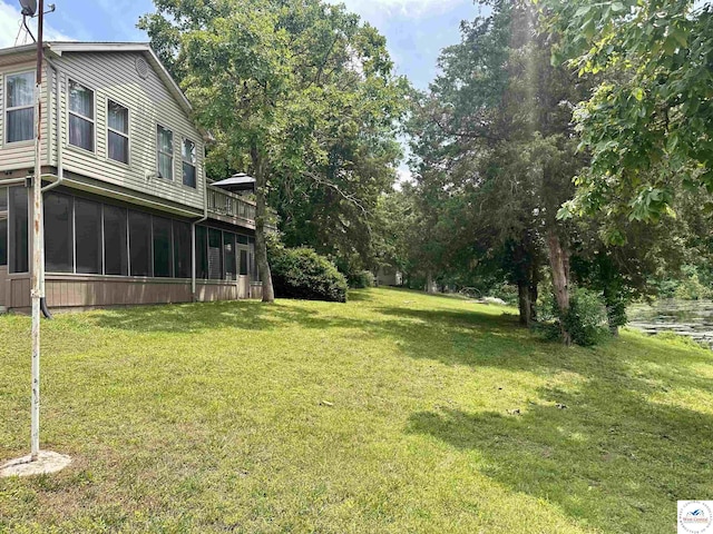 32291 Barclay Loop, Warsaw, MO 65355 - view of green lawn featuring a sunroom