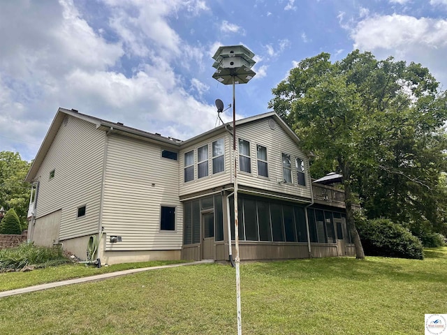32291 Barclay Loop, Warsaw, MO 65355 - back of house with a sunroom and a yard